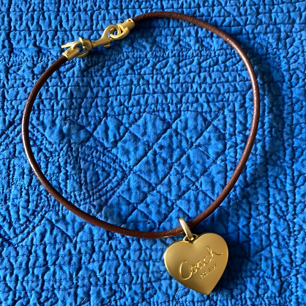 Coach leather and gold heart locket necklace